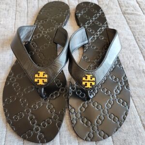 Tory Burch Black Sandals with Gold Emblem